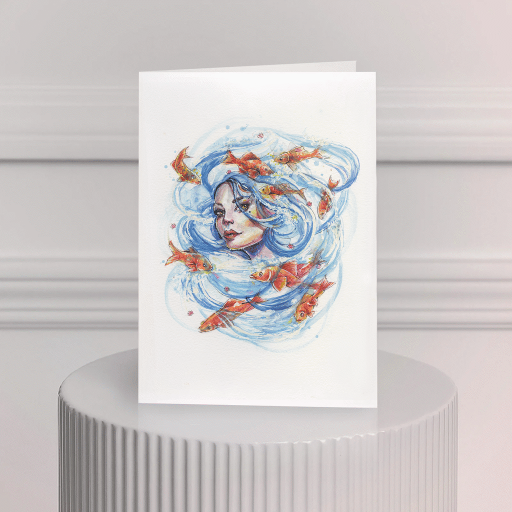 Carte de souhait aquarelle – femme aux cheveux d’océan et poisson