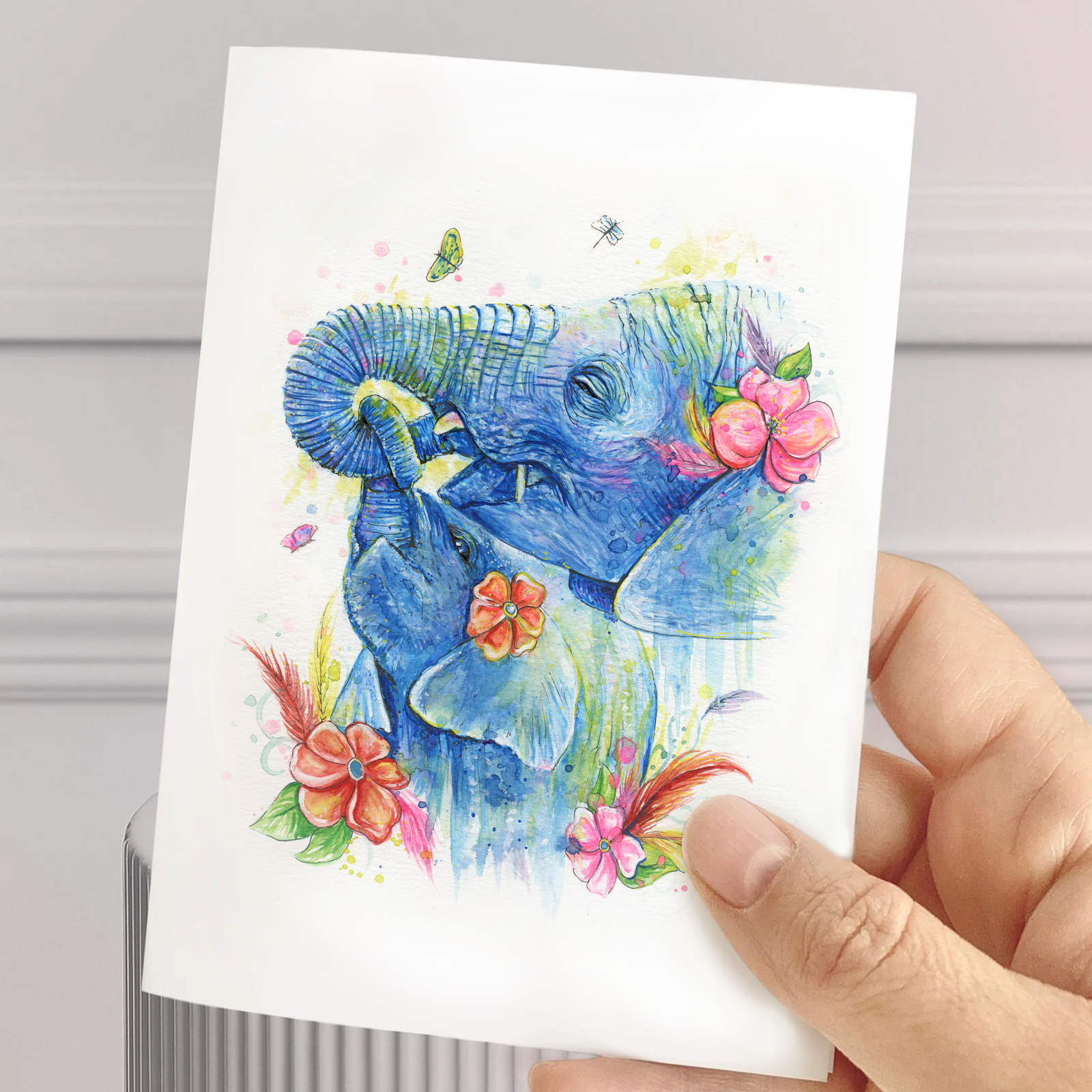 Carte de souhait aquarelle – éléphants et fleurs
